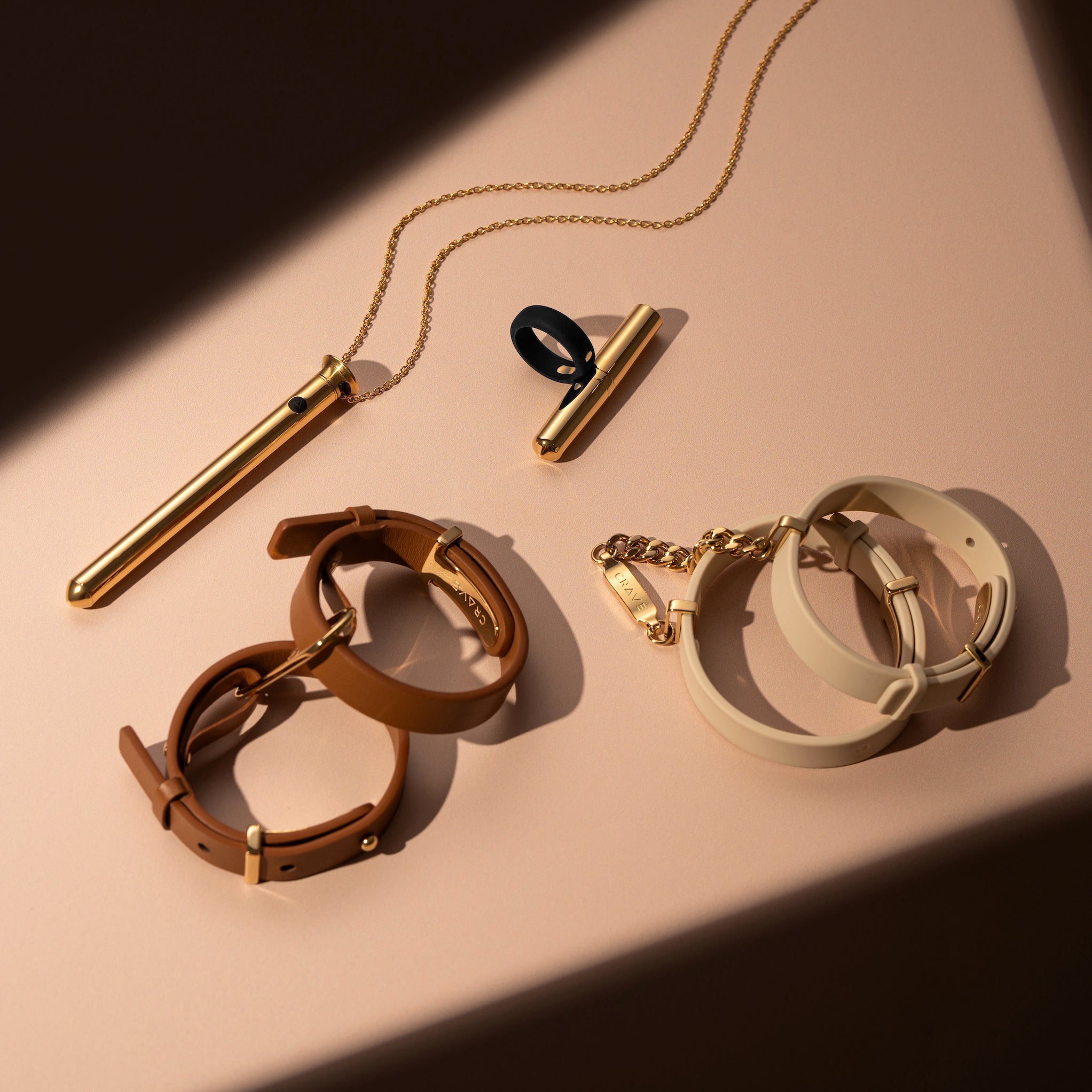 Pleasure Jewelry - Vibrator Necklace, Rings, Handcuffs | CRAVE