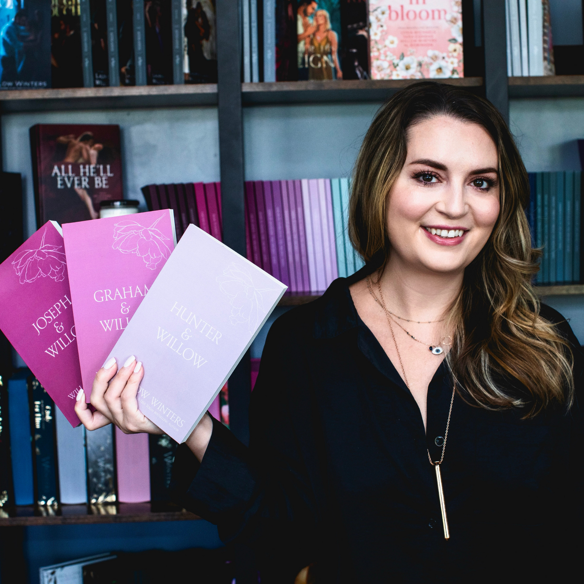 Winter Willows' with her books wearing Vesper.