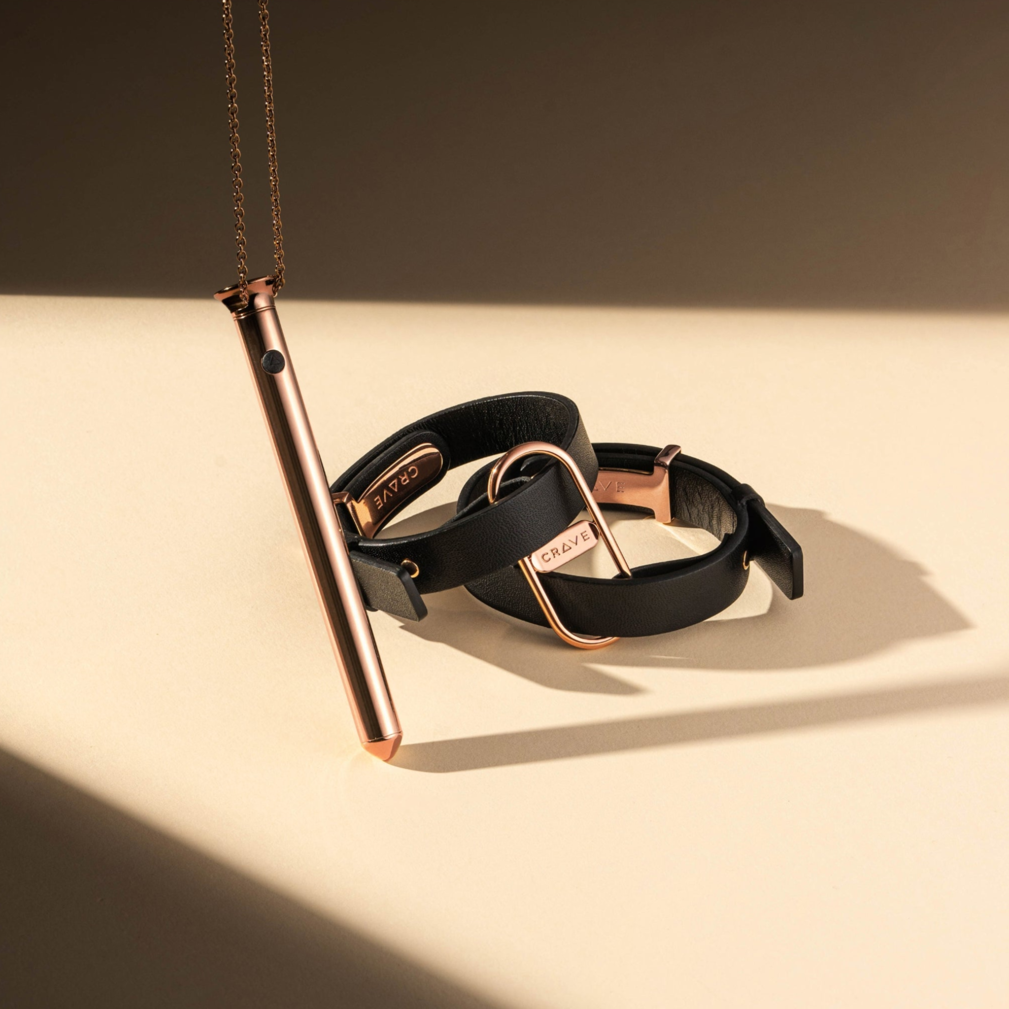 Vesper 2 in rose gold with ICON Cuffs in black and rose gold.
